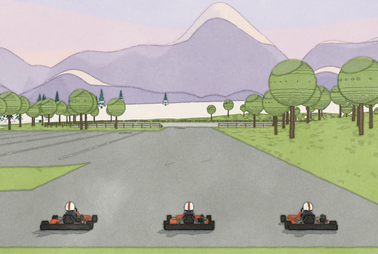 Three karts side by side on the straight, below purple mountains.